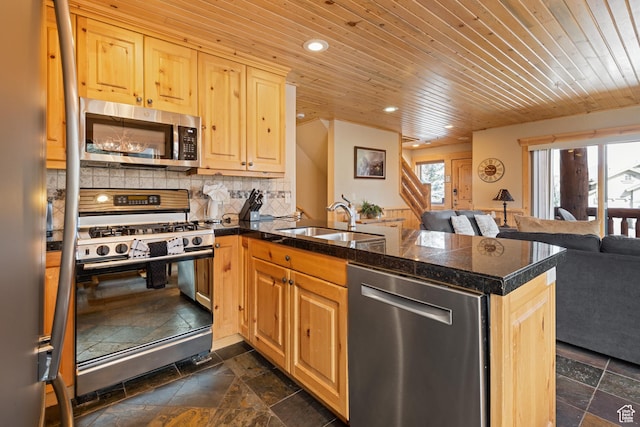 3995 N Timberwolf Ln Unit 1A, Park City, UT 84098 - kitchen featuring wooden ceiling, stone tile floors, appliances with stainless steel finishes, and a sink