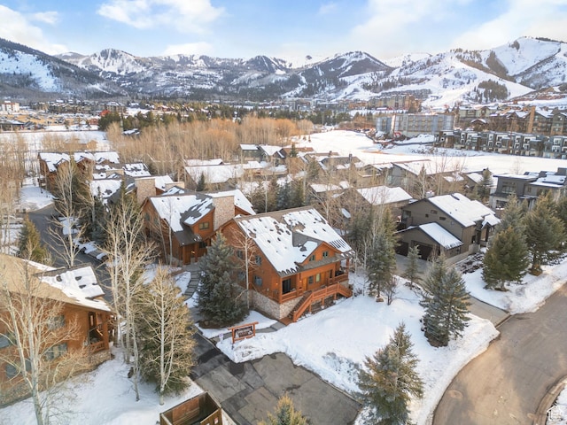 3995 N Timberwolf Ln Unit 1A, Park City, UT 84098 - snowy aerial view with a residential view and a mountain view