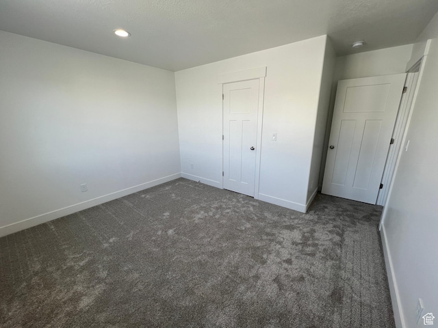 14 E 300 S, Delta, UT 84624 - unfurnished bedroom featuring baseboards, carpet flooring, and recessed lighting