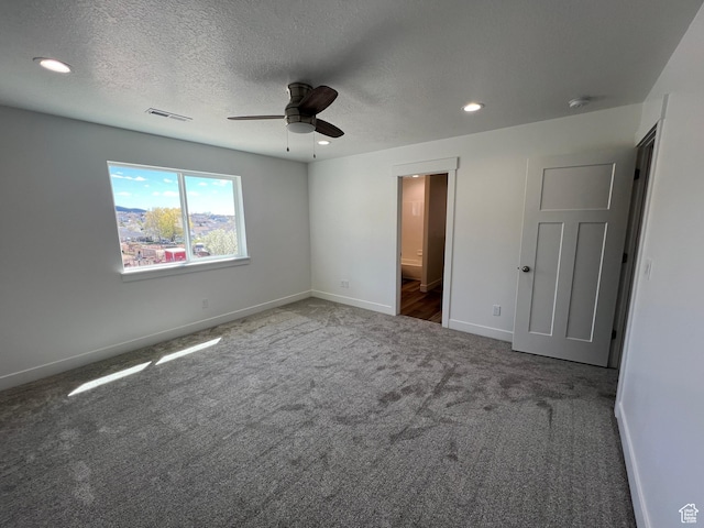 14 E 300 S, Delta, UT 84624 - unfurnished bedroom with baseboards, visible vents, a textured ceiling, carpet flooring, and recessed lighting