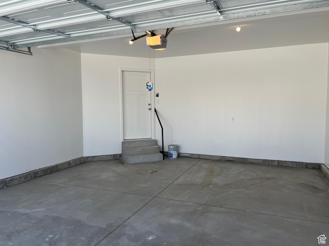 14 E 300 S, Delta, UT 84624 - garage with baseboards and a garage door opener