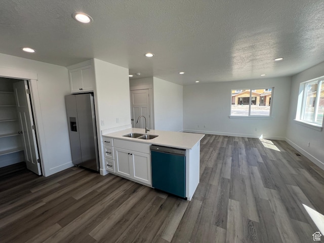14 E 300 S, Delta, UT 84624 - kitchen featuring a sink, white cabinets, stainless steel refrigerator with ice dispenser, and dishwasher