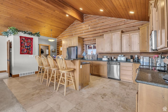 1973 W Modoc Loop, Coalville, UT 84017 - kitchen featuring rustic walls, wooden ceiling, visible vents, and appliances with stainless steel finishes