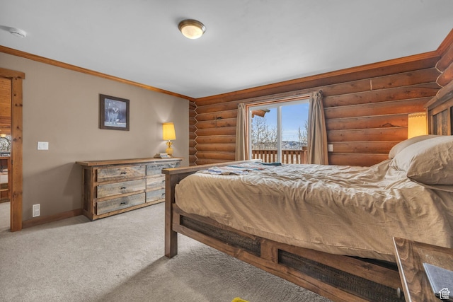 1973 W Modoc Loop, Coalville, UT 84017 - bedroom with baseboards, access to exterior, log walls, carpet, and crown molding