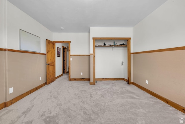 1973 W Modoc Loop, Coalville, UT 84017 - unfurnished bedroom featuring a closet, light colored carpet, and baseboards