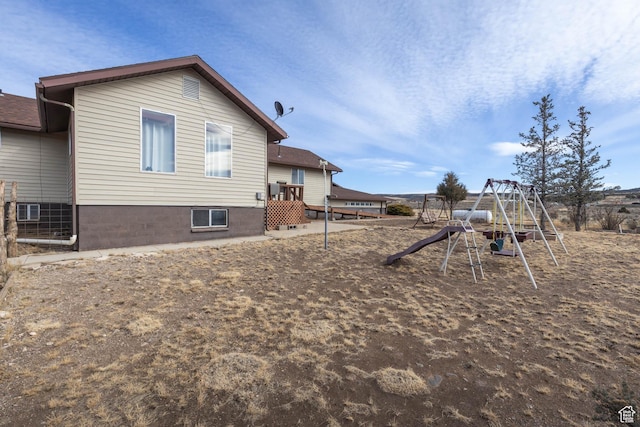 86 E 1000 S, Panguitch, UT 84759 - rear view of house featuring a playground
