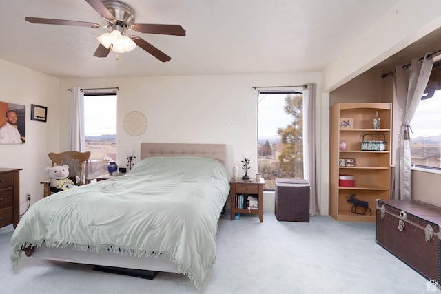 86 E 1000 S, Panguitch, UT 84759 - bedroom featuring a ceiling fan and light carpet