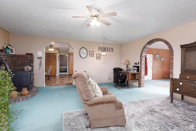 86 E 1000 S, Panguitch, UT 84759 - living area featuring a ceiling fan, arched walkways, and a textured ceiling