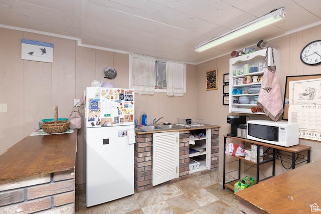 86 E 1000 S, Panguitch, UT 84759 - kitchen with crown molding, white appliances, and a sink