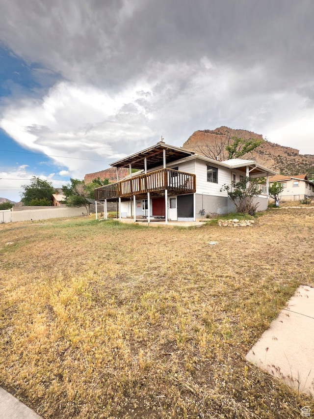 138 W 100 N, East Carbon, UT 84520 - back of house with a wooden deck