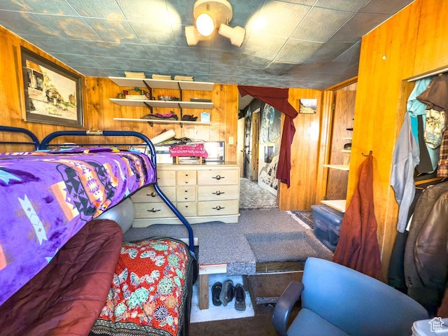 138 W 100 N, East Carbon, UT 84520 - bedroom featuring wood walls and carpet floors