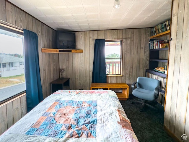 138 W 100 N, East Carbon, UT 84520 - carpeted bedroom featuring wooden walls