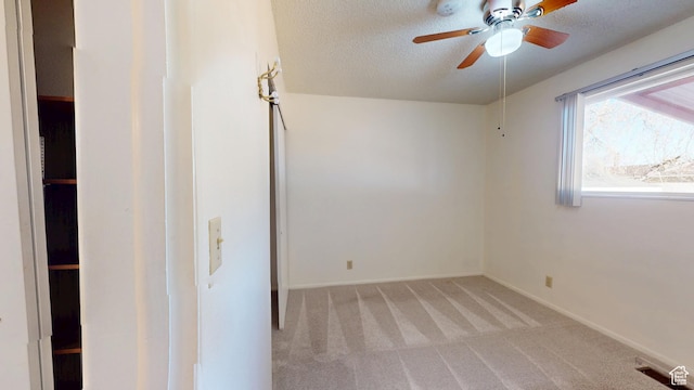 1120 Bulloch Cir, Cedar City, UT 84721 - empty room with a textured ceiling, ceiling fan, baseboards, and light colored carpet