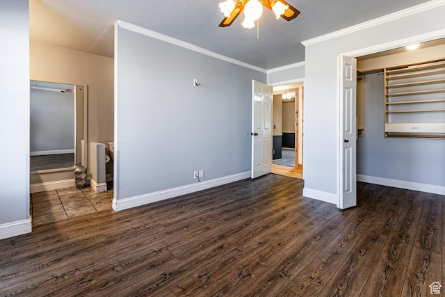 unfurnished bedroom featuring dark wood-style floors, ceiling fan, crown molding, and baseboards