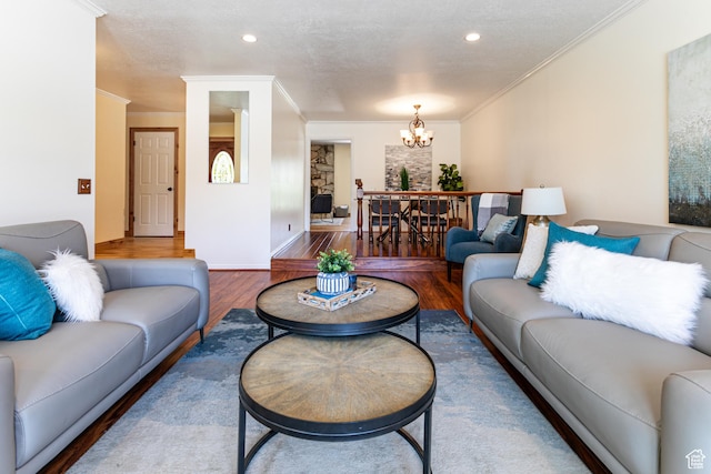 1963 E Rio Way E, Sandy, UT 84093 - living area featuring wood finished floors, a chandelier, ornamental molding, recessed lighting, and baseboards