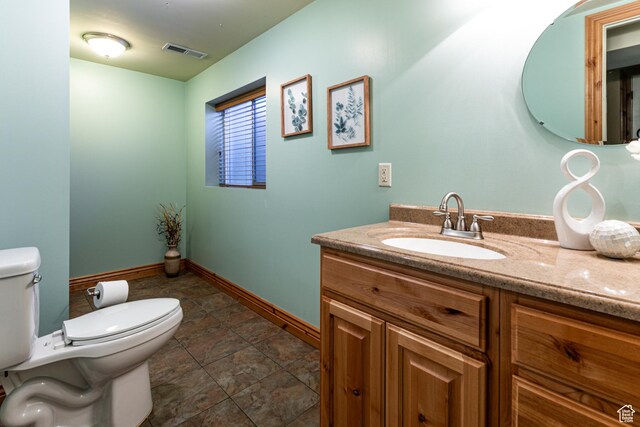 1963 E Rio Way E, Sandy, UT 84093 - bathroom featuring toilet, vanity, and baseboards