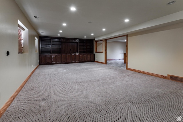 empty room with light carpet, baseboards, visible vents, and recessed lighting