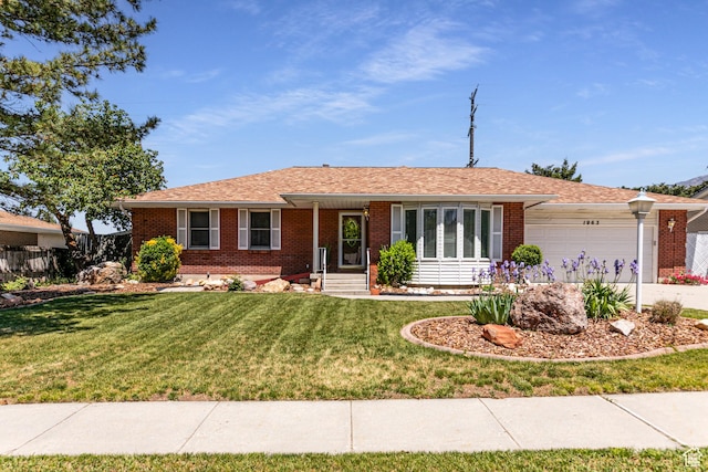 1963 E Rio Way E, Sandy, UT 84093 - ranch-style house featuring brick siding, an attached garage, a front yard, and driveway