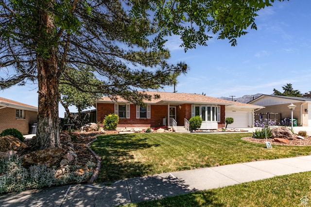 1963 E Rio Way E, Sandy, UT 84093 - ranch-style home featuring a garage, brick siding, a front yard, and concrete driveway