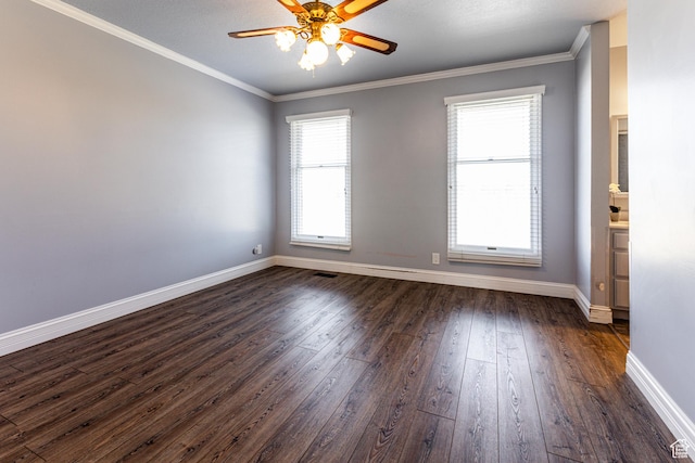 empty room featuring ceiling fan, ornamental molding, dark wood-style flooring, and baseboards