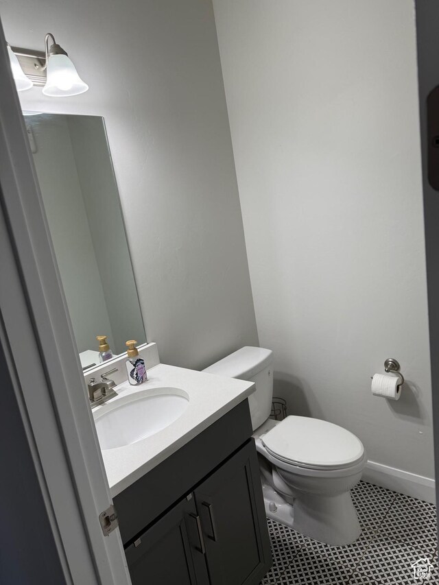 13592 S Conie Bell Dr, Herriman, UT 84096 - bathroom with vanity, toilet, and baseboards