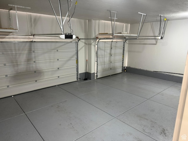 13592 S Conie Bell Dr, Herriman, UT 84096 - garage featuring baseboards and a garage door opener