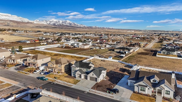 aerial view featuring a mountain view and a residential view