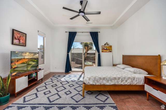340 N Snow Canyon Dr Unit 4, Ivins, UT 84738 - bedroom featuring a ceiling fan, access to outside, baseboards, and a tray ceiling