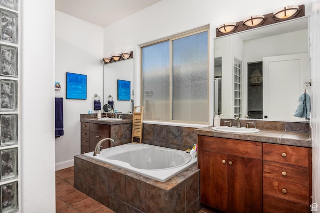 340 N Snow Canyon Dr Unit 4, Ivins, UT 84738 - full bathroom with tile patterned floors, two vanities, a sink, and a bath