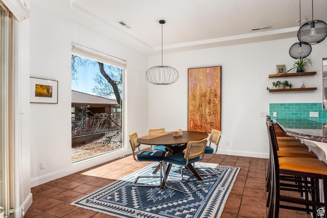 340 N Snow Canyon Dr Unit 4, Ivins, UT 84738 - tiled dining space featuring a tray ceiling, visible vents, and baseboards