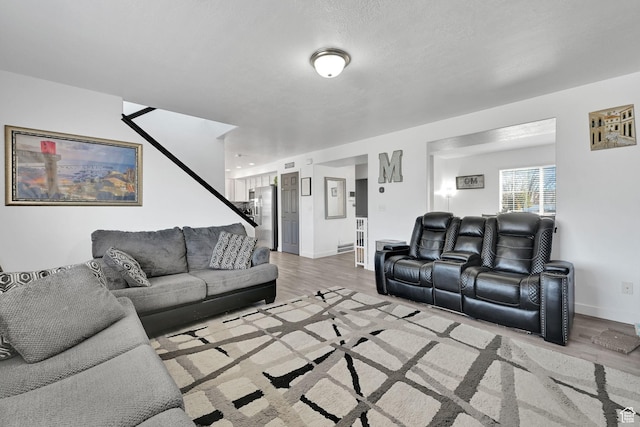 1087 N 1000 W, Clinton, UT 84015 - living area with light wood-style floors and baseboards