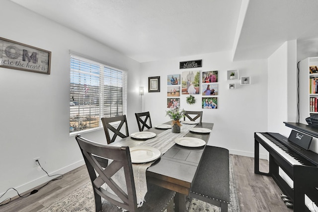 1087 N 1000 W, Clinton, UT 84015 - dining area featuring baseboards and wood finished floors