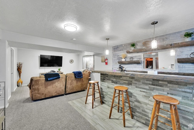 1087 N 1000 W, Clinton, UT 84015 - bar with decorative light fixtures, a textured ceiling, and a dry bar