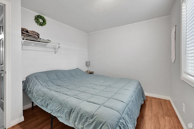 1087 N 1000 W, Clinton, UT 84015 - bedroom with baseboards and wood finished floors