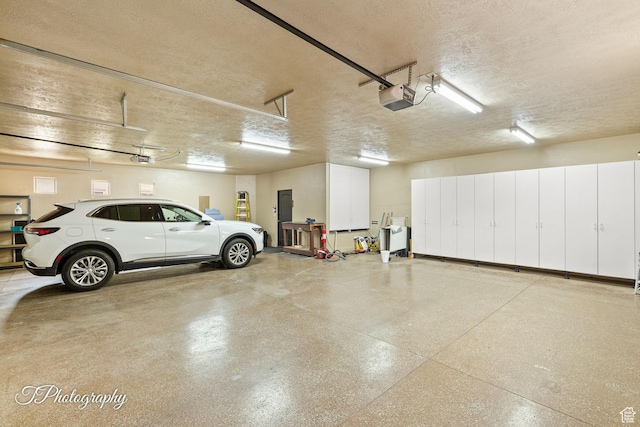 2275 E Rustic Dr, St George, UT 84790 - parking garage featuring electric panel and a garage door opener