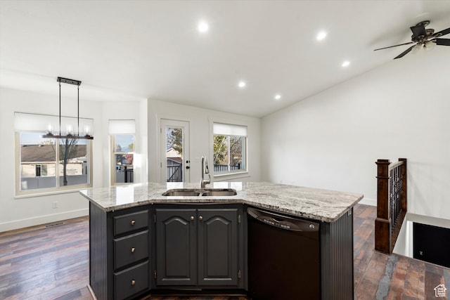 kitchen with a ceiling fan, a sink, light stone countertops, black dishwasher, and recessed lighting