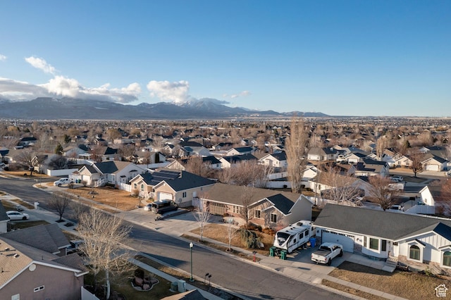 aerial view with a mountain view and a residential view