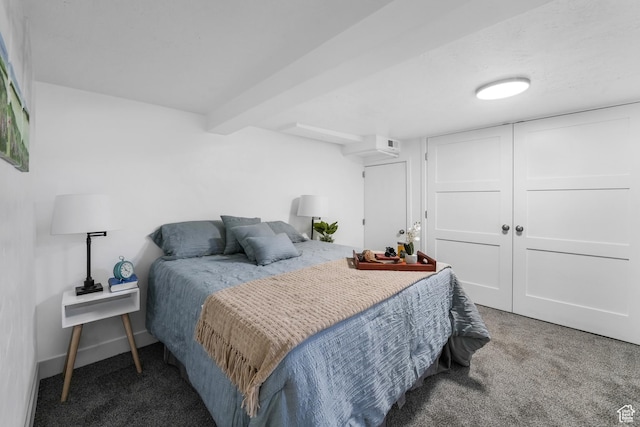 carpeted bedroom featuring baseboards