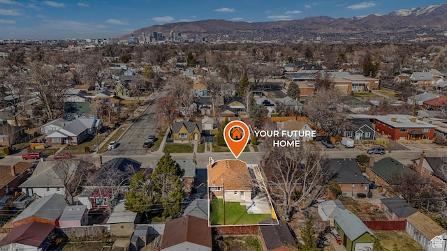 bird's eye view featuring a residential view and a mountain view