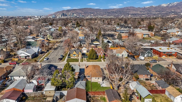 aerial view featuring a mountain view and a residential view