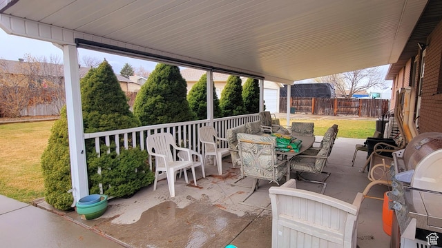 4142 S 3425 W, West Valley City, UT 84119 - view of patio with outdoor dining area and an outbuilding