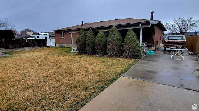 4142 S 3425 W, West Valley City, UT 84119 - view of home's exterior featuring brick siding