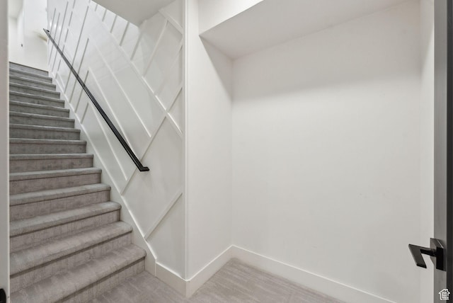 stairway with baseboards