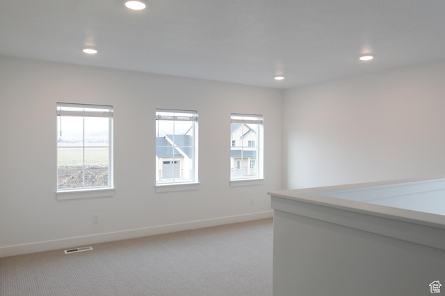 729 E 1250 S, Hyrum, UT 84319 - empty room with healthy amount of natural light, light carpet, recessed lighting, and baseboards