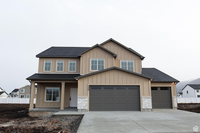 729 E 1250 S, Hyrum, UT 84319 - craftsman house with covered porch, driveway, stone siding, board and batten siding, and fence