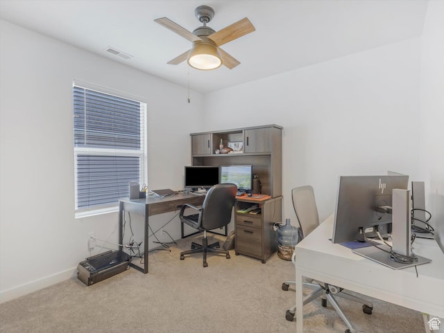 1673 N Aaron Dr E, Tooele, UT 84074 - home office featuring baseboards, carpet floors, visible vents, and a ceiling fan