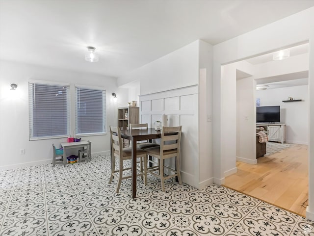 1673 N Aaron Dr E, Tooele, UT 84074 - dining room with baseboards