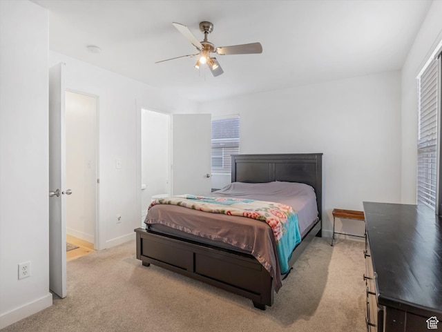 1673 N Aaron Dr E, Tooele, UT 84074 - bedroom featuring light carpet, ceiling fan, and baseboards