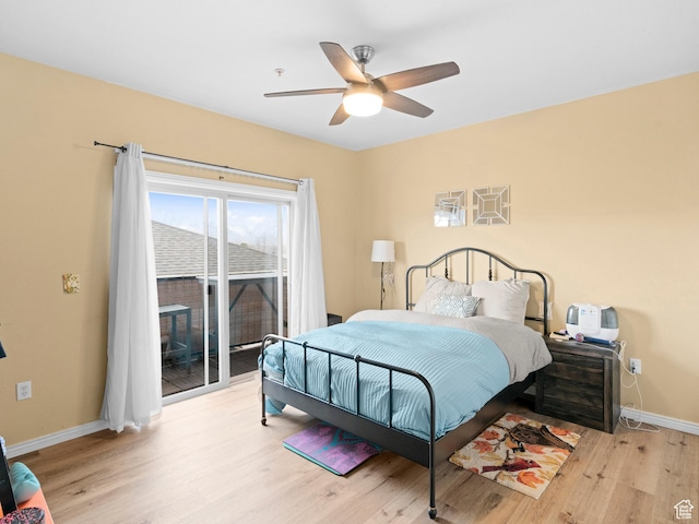 3478 S Cozy River Pl W Unit 203, West Valley City, UT 84119 - bedroom with ceiling fan, access to outside, baseboards, and light wood-style flooring
