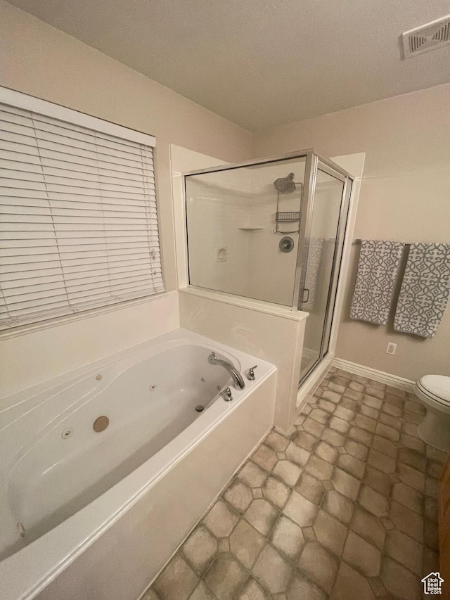 564 W 475 N, Clearfield, UT 84015 - full bath with a tub with jets, a shower stall, toilet, visible vents, and a textured ceiling